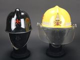 two helmets that are sitting on top of each other