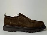 a picture of a pair of brown sued shoes on a white background