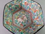 an image of a colorful bowl sitting on top of a table