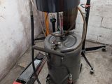 une image représentant une machine surmontée d'un godet