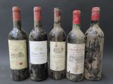 six bottles of wine are lined up in a row