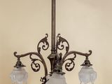 an image of a chandelier hanging from a ceiling in a room