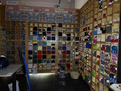 a room filled with lots of different types of yarn