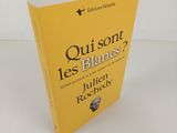 a yellow book sitting on top of a white table
