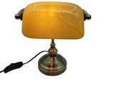 an image of a yellow table lamp with a black cord