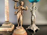 three different types of lamps that are on a table