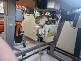 a machine that is sitting on a stand in a room
