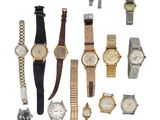 de nombreuses montres posées sur une surface blanche