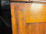 a close up of a piece of wood on a table