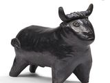 sculpture of a bull with horns on a white background