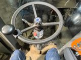 a man that is sitting in the drivers seat of a truck