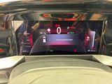 a picture of a car dashboard with a digital display