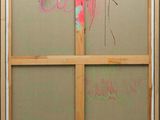 a picture of a picture of a window with graffiti on it