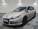 a picture of a white car parked in a garage