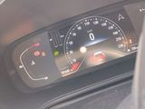 a close up of a car dashboard with a speedometer