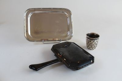 a small mirror and a small mirror on a table
