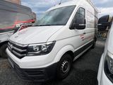 a white van that is parked in a parking lot