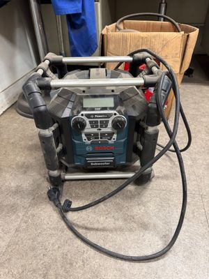 the corded drill is connected to the corded machine in the room