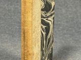 a small book that is sitting on a table