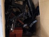 a cardboard box with a bunch of tools inside of it