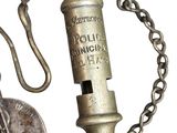 a small metal fire hydrant and a coin on a chain