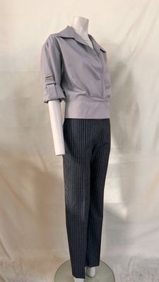 an image of a mannequin wearing a suit and tie