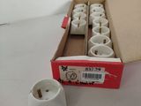 a box of cups sitting on a table next to a box of cups