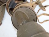 a close up view of a pair of military goggles on a table