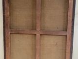 an old wooden window frame with four panes of glass in it