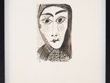 an image of a drawing of a woman ' s face in a black frame