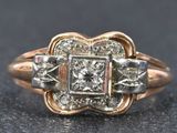 an image of a diamond ring on a table