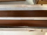 a picture of a piece of wood that has been painted brown