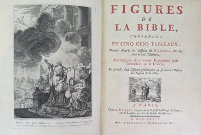 an open book with a picture of a man standing in front of a fire