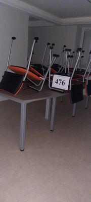 a lot of chairs that are sitting in a room
