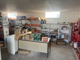 a room with a lot of boxes and boxes on the shelves