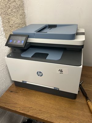 a printer that is sitting on top of a table