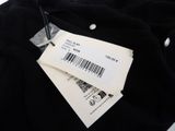 the back of a black jacket with a barcode on it