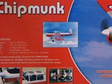a box with a picture of a red and white airplane