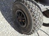 a close up view of a wheel on a lawn mower
