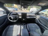 the interior of a car with a steering wheel, dashboard, and dash board