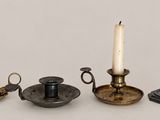 five different types of candles on the table
