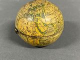 yellow and green globe shaped box with a map on it