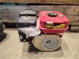 a small engine that is sitting on the floor