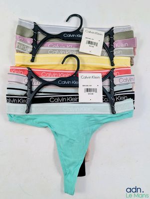 a close up of a group of underwear on a white surface