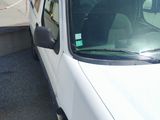 a white truck that is parked in a parking lot