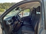 the interior of a car with the driver ' s seat folded down