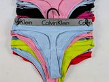 a group of five women ' s briefs on a hanger