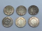 six pièces britanniques différentes, dont un penny, un penny, un penny, un penny et un penny