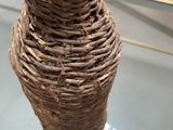 a vase that is sitting on a table in a room