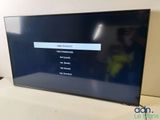 a close up of a flat screen tv sitting on top of a table